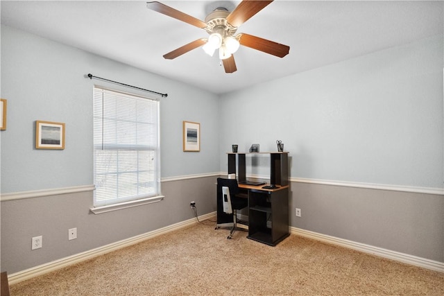 office area with light colored carpet and ceiling fan