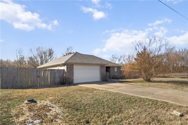 view of side of home with a garage