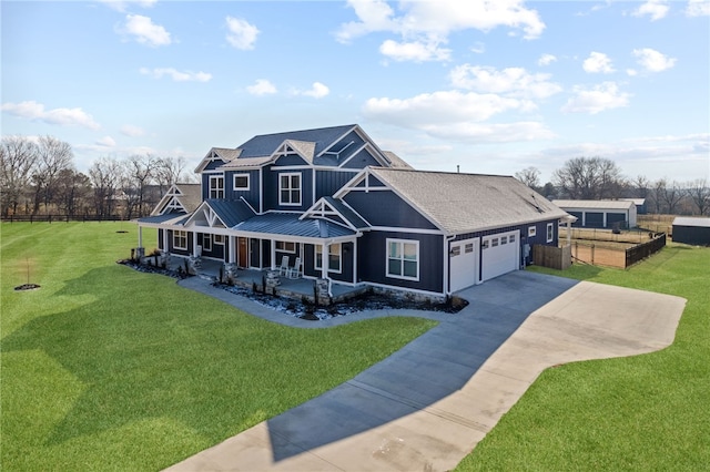 view of front of house with driveway, a porch, board and batten siding, an attached garage, and a front yard