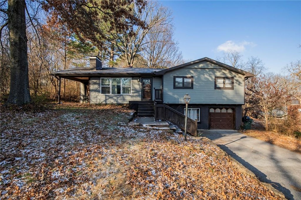 view of front of property with a garage