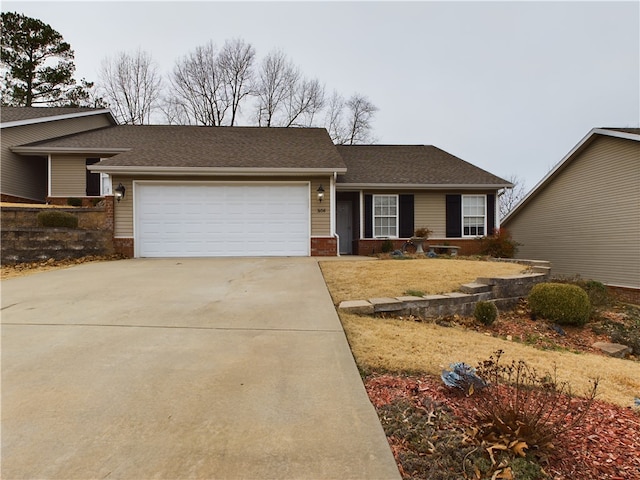 ranch-style home with a garage