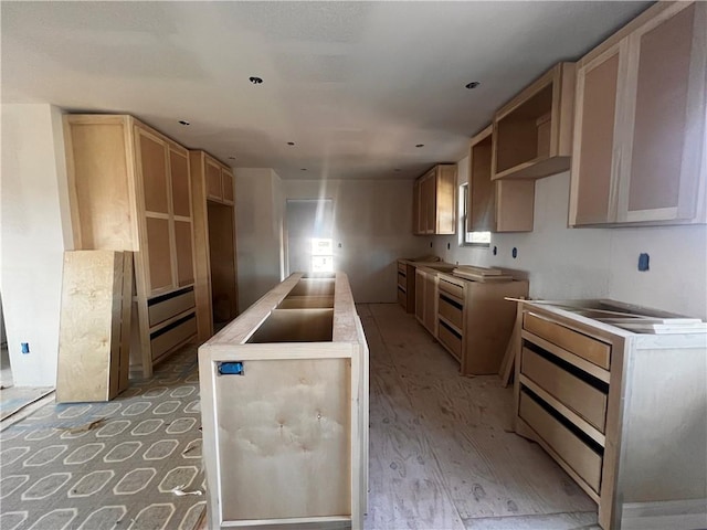 kitchen with light brown cabinetry