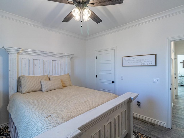 bedroom featuring ceiling fan, dark hardwood / wood-style flooring, and ornamental molding