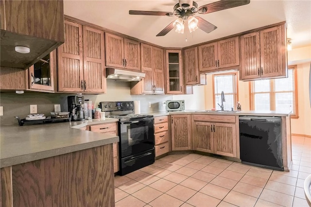 kitchen with ceiling fan, sink, light tile patterned flooring, and black appliances