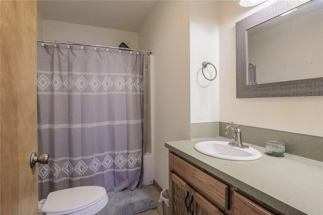 full bathroom with tile patterned floors, vanity, shower / bath combination with curtain, and toilet