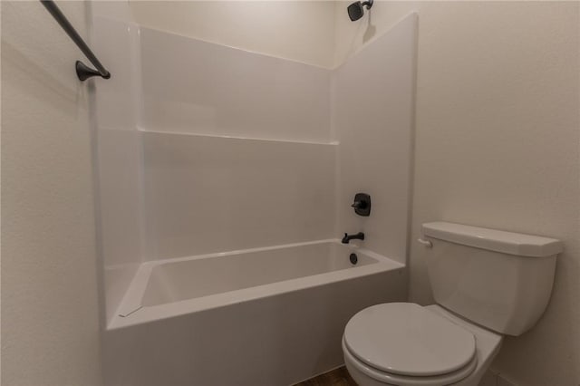 bathroom with toilet and shower / washtub combination