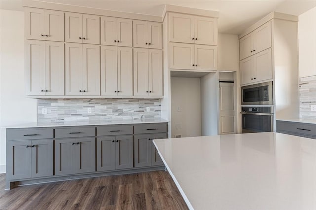 13121 Bethel Blacktop Rd, Farmington, AR 72730 - kitchen with tasteful backsplash, gray cabinets, and stainless steel appliances