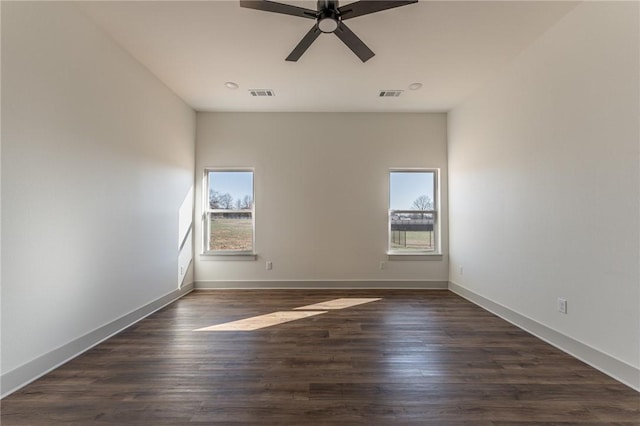 13121 Bethel Blacktop Rd, Farmington, AR 72730 - empty room with a wealth of natural light, visible vents, and a ceiling fan