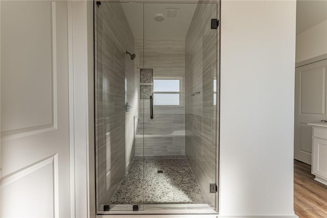 13121 Bethel Blacktop Rd, Farmington, AR 72730 - full bathroom with vanity, wood finished floors, and a stall shower