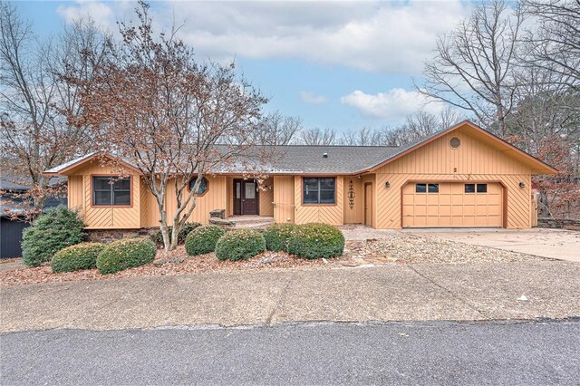 single story home featuring a garage