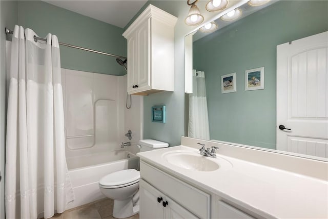 full bathroom with tile patterned flooring, vanity, toilet, and shower / bath combo with shower curtain