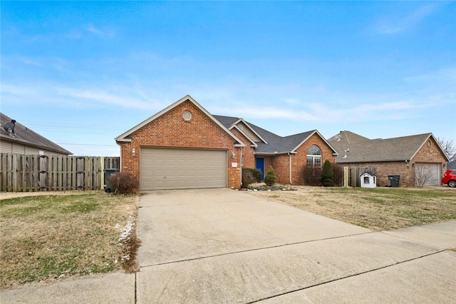 view of front facade with a garage and a front yard