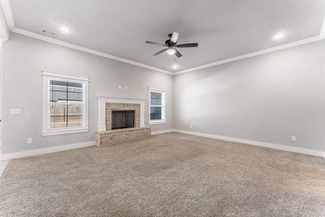 unfurnished living room featuring carpet floors, ceiling fan, and a wealth of natural light