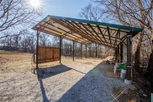 exterior space with a carport