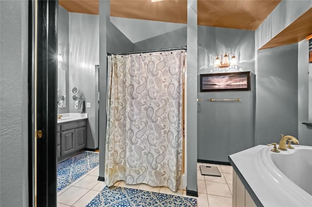 full bathroom featuring a shower with curtain, vanity, and tile patterned floors