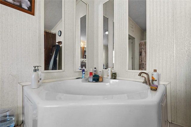 bathroom featuring a textured ceiling