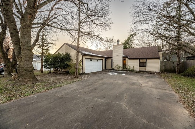 view of front of property featuring a garage