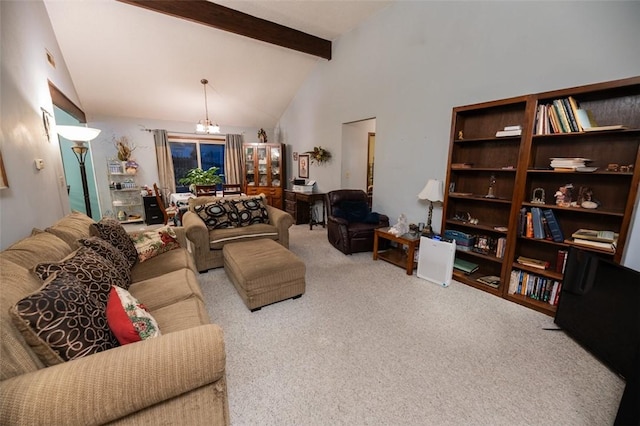 carpeted living room featuring beamed ceiling, a chandelier, and high vaulted ceiling