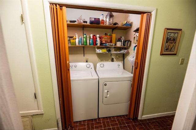 washroom with separate washer and dryer