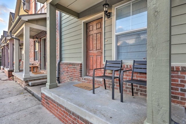 property entrance with a porch