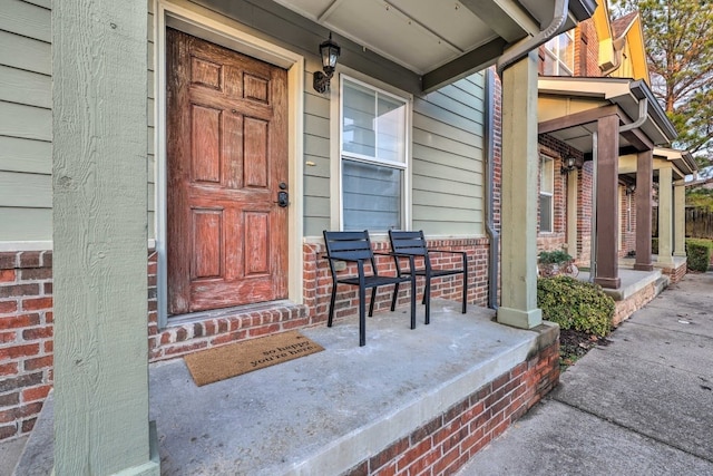 entrance to property with covered porch