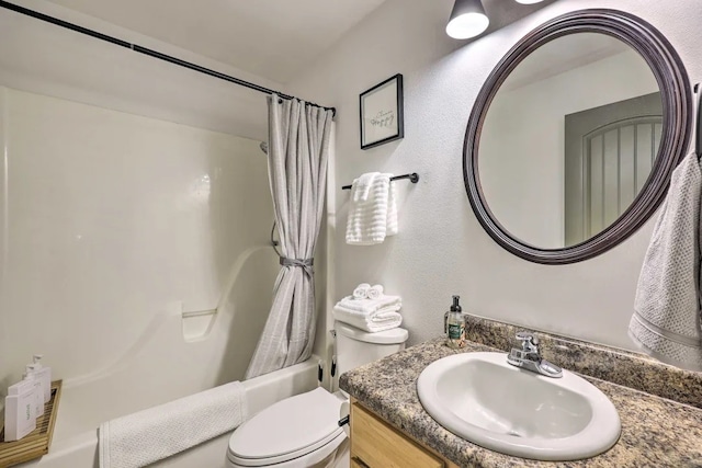 full bathroom with vanity, shower / bathtub combination with curtain, and toilet