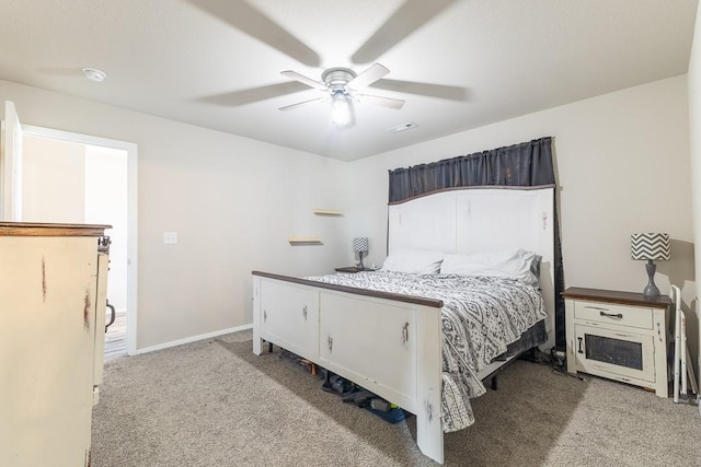 bedroom with ceiling fan and light colored carpet