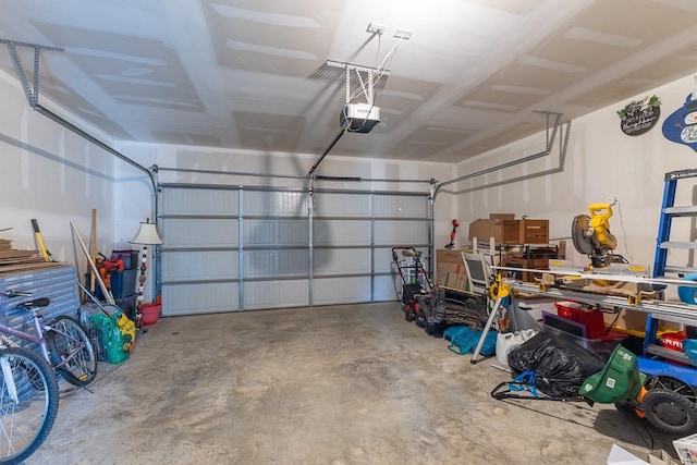 garage featuring a garage door opener