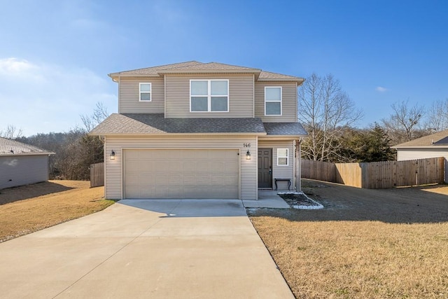 front facade with a garage and a front yard