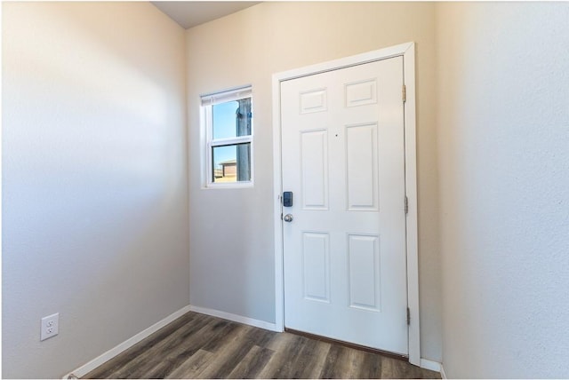 doorway with dark hardwood / wood-style floors