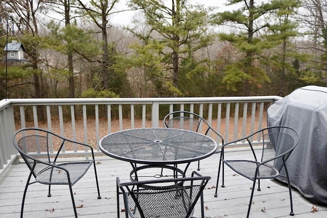 wooden terrace with grilling area