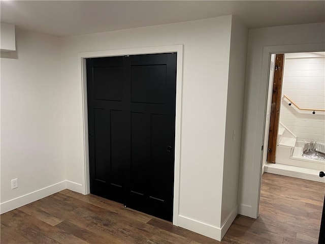 interior space featuring dark wood-type flooring