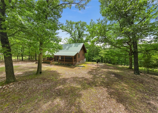 view of yard featuring a deck