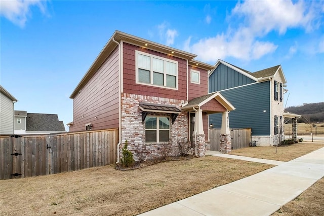 view of front of home with a front yard