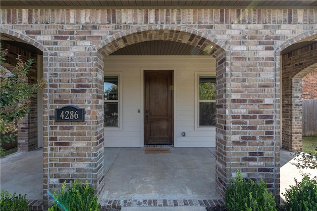 entrance to property with a porch