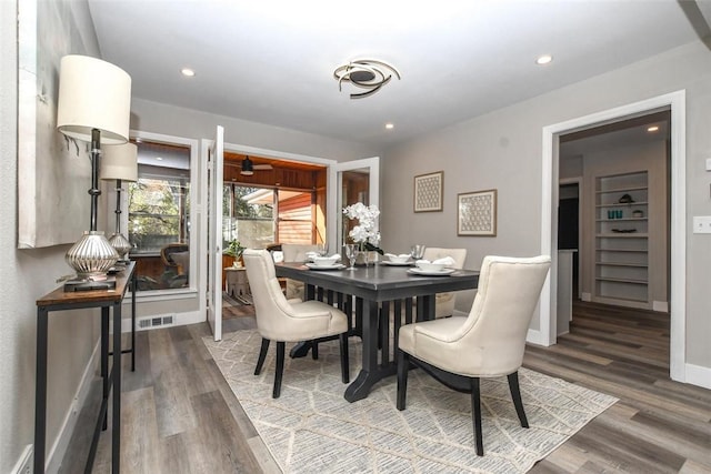 dining area featuring hardwood / wood-style flooring