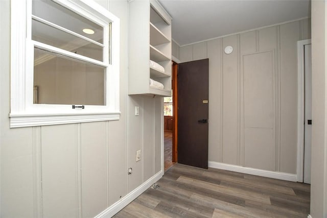 hallway featuring dark hardwood / wood-style floors