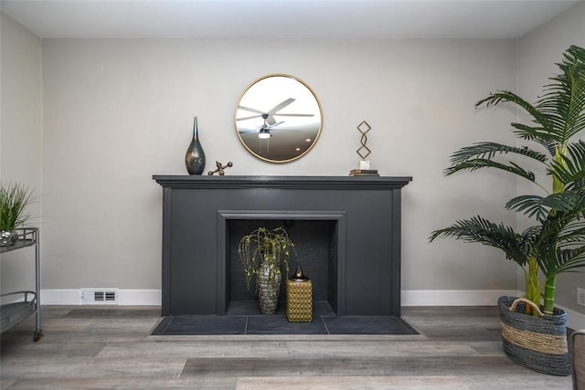 interior details featuring wood-type flooring