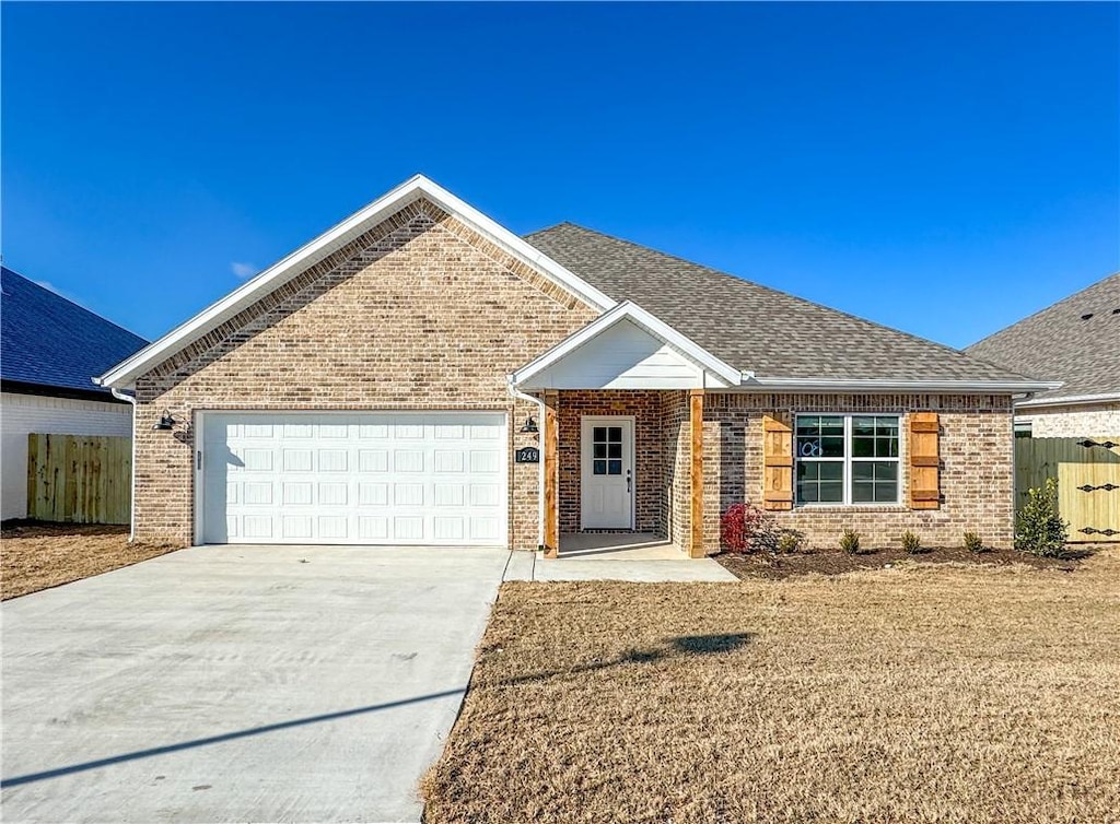 view of front of property with a garage