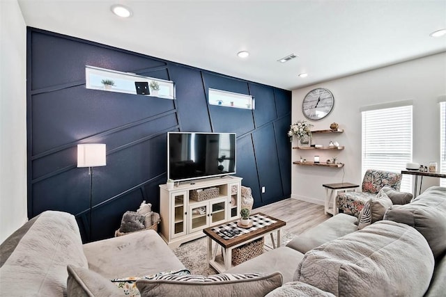 living room with light hardwood / wood-style floors