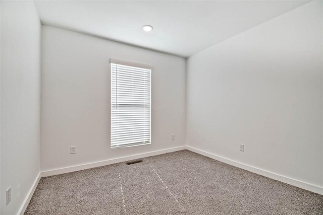 view of carpeted spare room