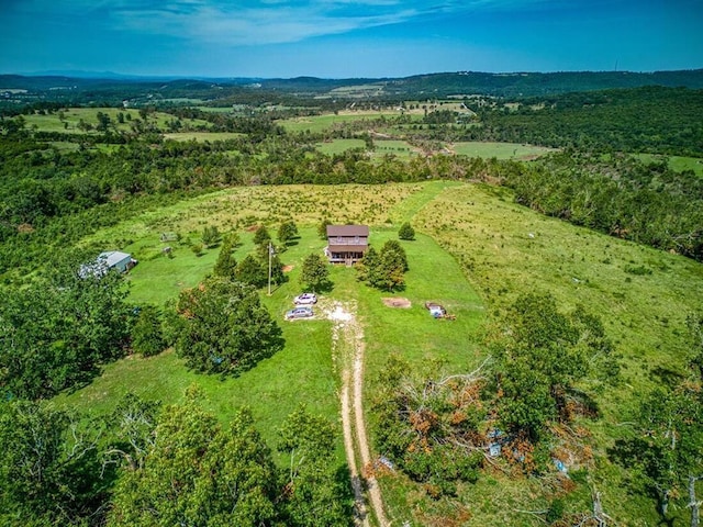 birds eye view of property featuring a rural view