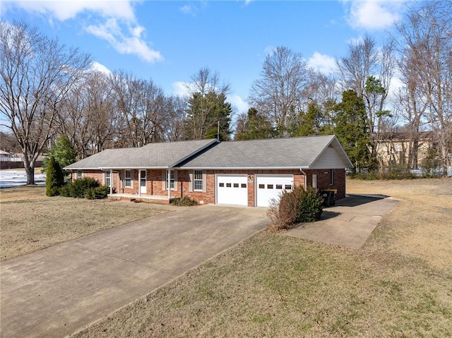 ranch-style house with covered porch, a front yard, and a garage