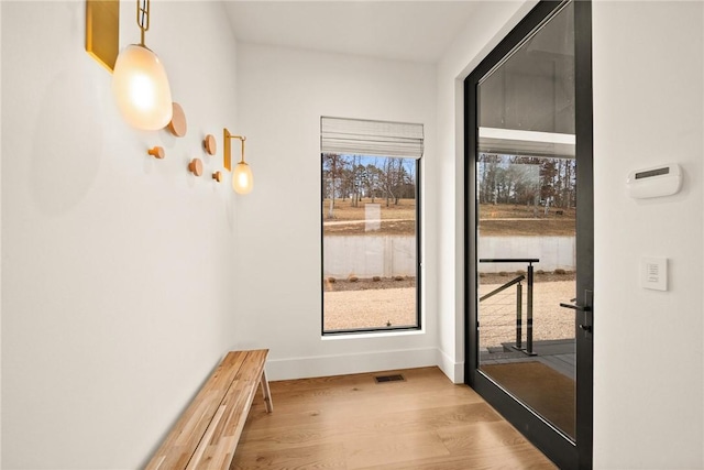 doorway featuring light hardwood / wood-style flooring