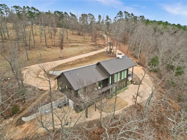 birds eye view of property with a rural view