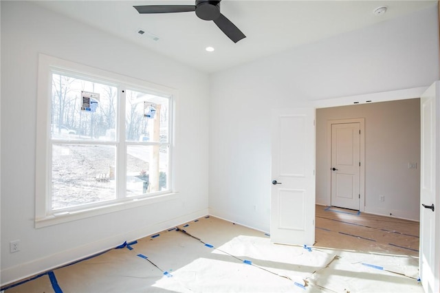 unfurnished room featuring a ceiling fan, recessed lighting, and visible vents