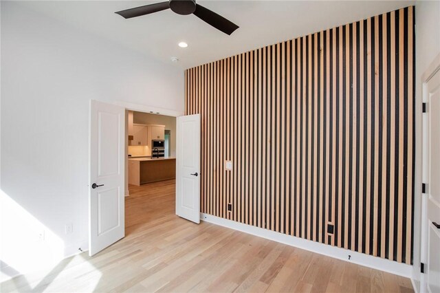 20 Singleton Dr, Bella Vista, AR 72715 - spare room featuring a ceiling fan, light wood-style flooring, and recessed lighting