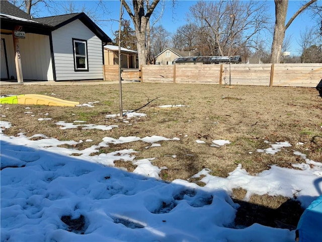 view of yard covered in snow