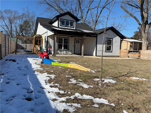 bungalow featuring a playground