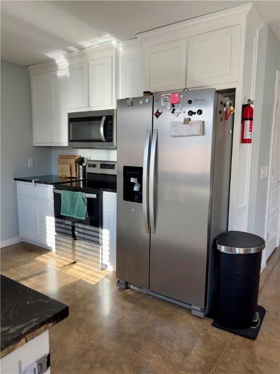 kitchen featuring white cabinets and stainless steel appliances